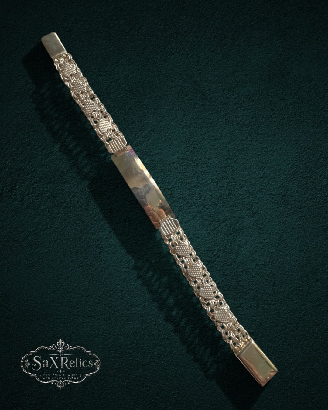 My Store vintage-inspired metal ID bracelet with intricate textured chain links and a polished center plate