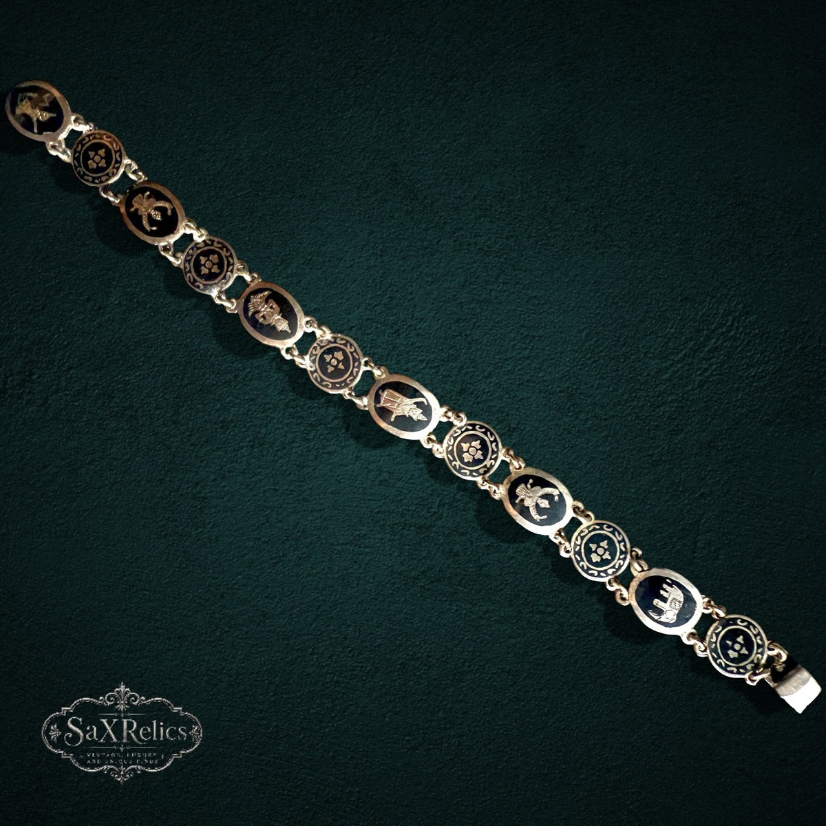SaX Relics — Azabache Siam niello sterling silver link bracelet shown full length.