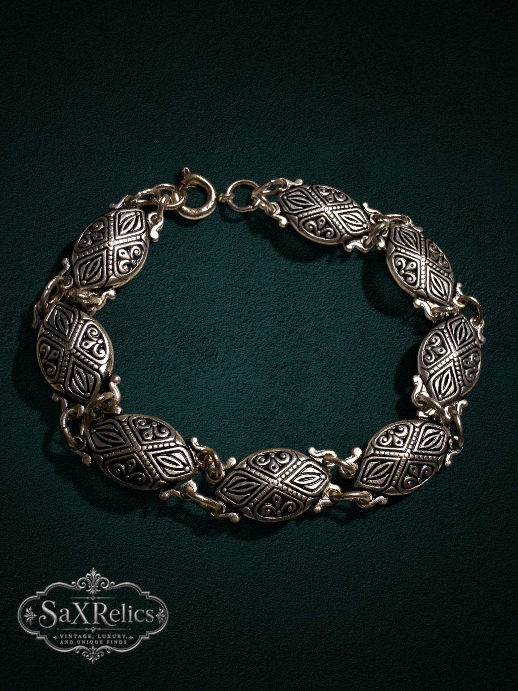 My Store vintage-inspired link bracelet featuring intricately embossed oval links in an antique silver-tone finish.