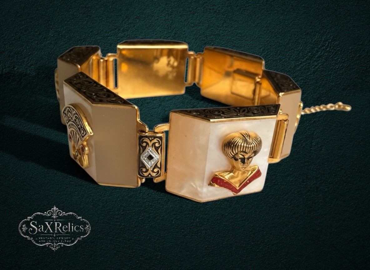 My Store vintage link bracelet featuring cream resin panels, gold-tone filigree, and ornate portrait motifs.