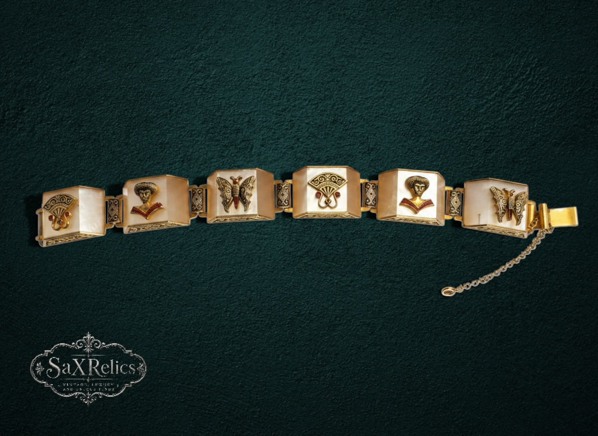 My Store vintage link bracelet featuring cream resin panels, gold-tone filigree, butterfly motifs, and portrait busts.