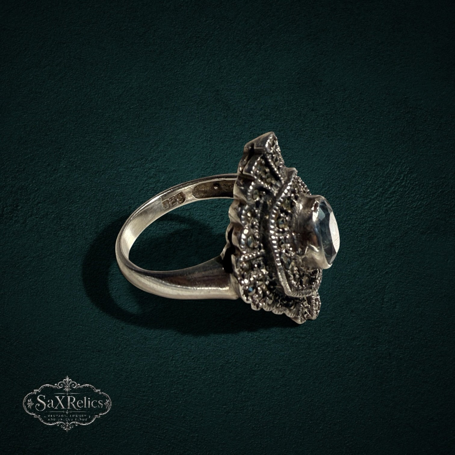 My Store vintage style sterling silver statement ring with an oval light blue stone and ornate marcasite detailing.