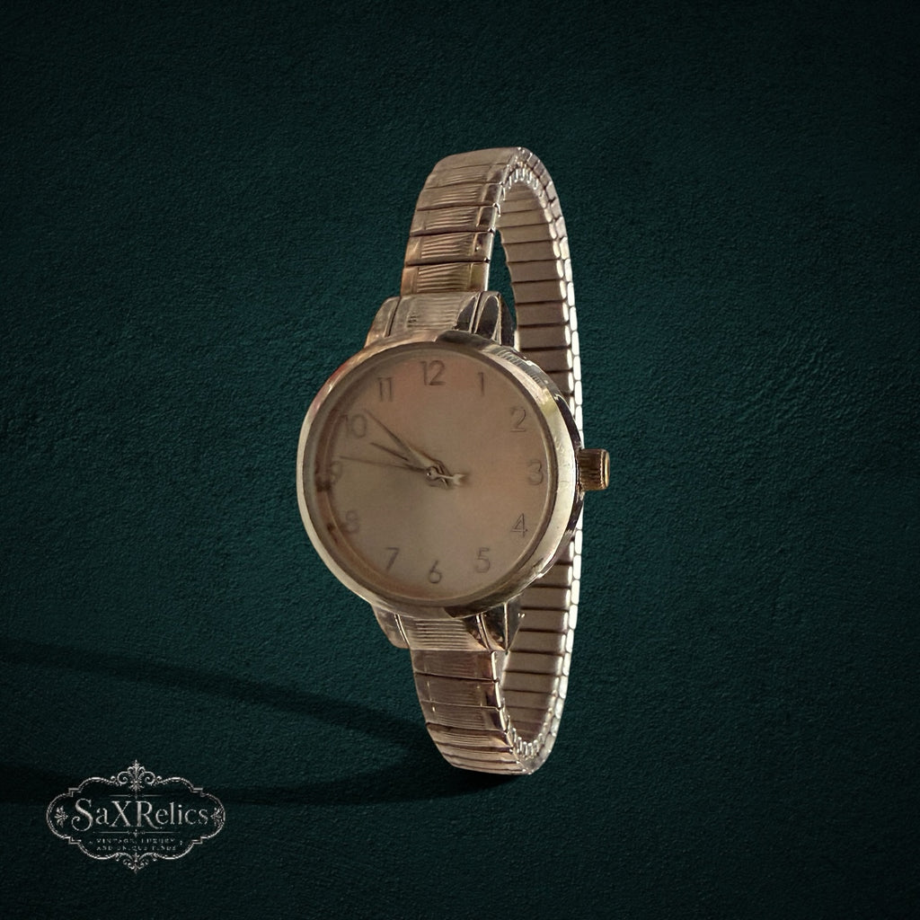 SaX Relics vintage silver-tone ladies' watch with a round dial and stretch expansion band