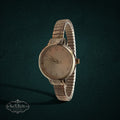 SaX Relics vintage silver-tone ladies' watch with a round dial and stretch expansion band