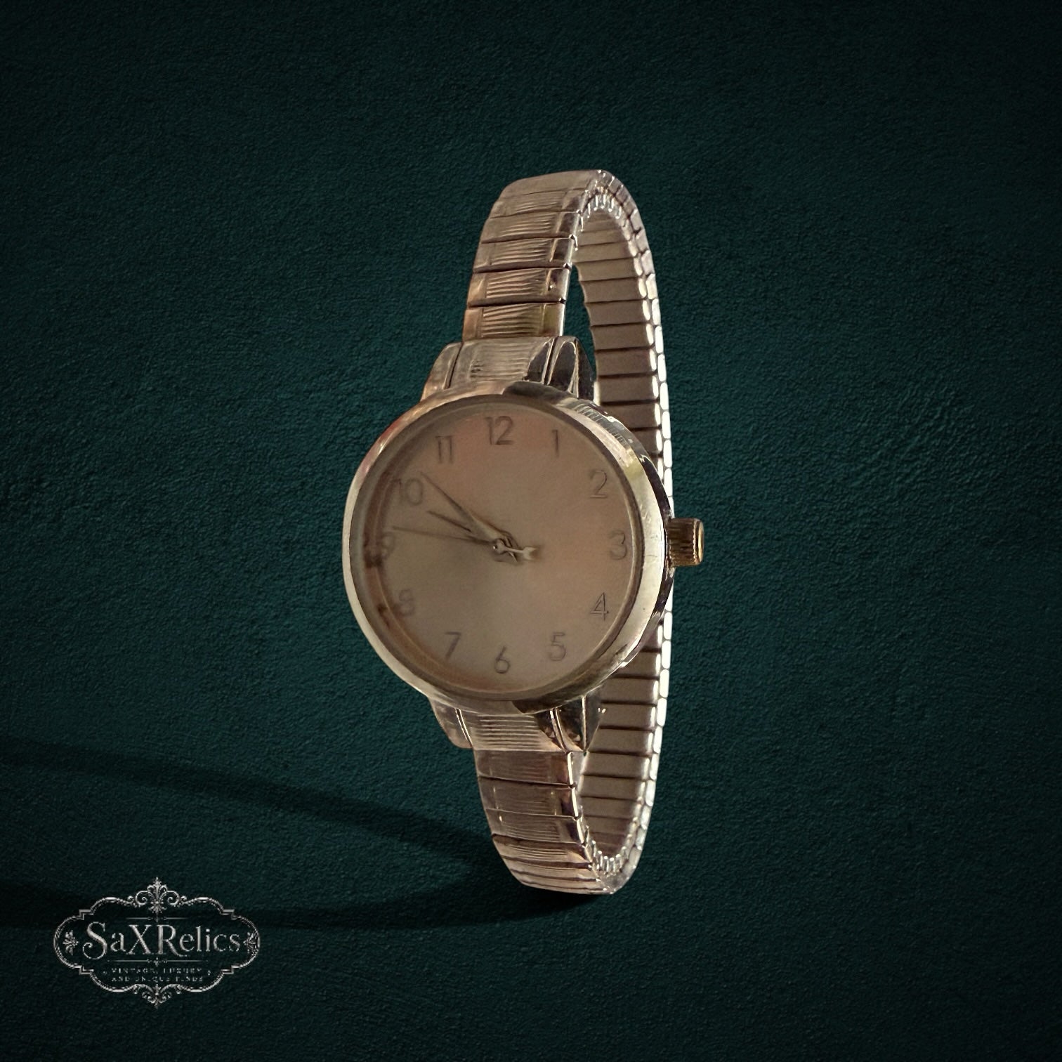 SaX Relics vintage silver-tone ladies' watch with a round dial and stretch expansion band