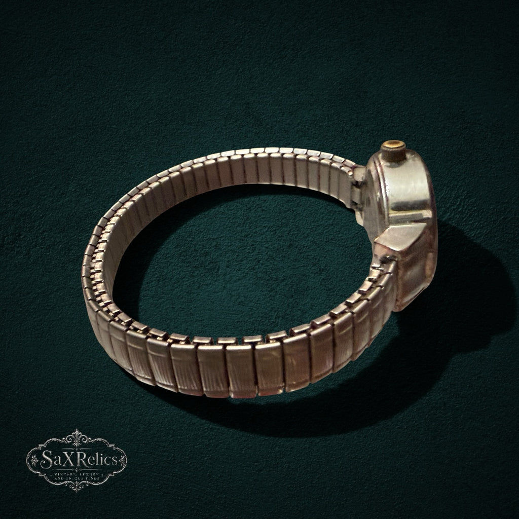 SaX Relics vintage silver-tone ladies' watch on its flexible expansion band
