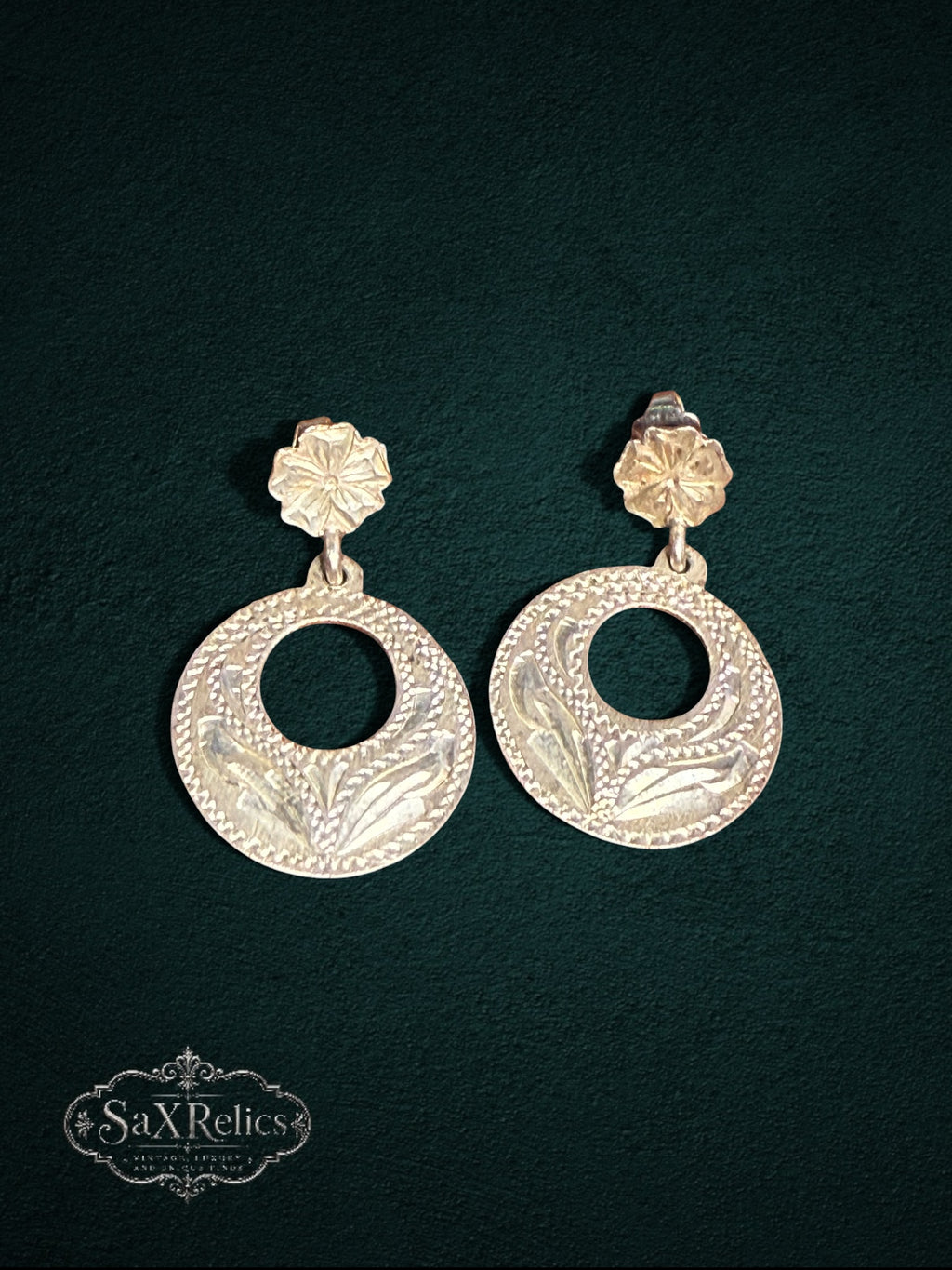 My Store vintage Mexican sterling silver drop earrings featuring circular floral engravings and flower-shaped studs.