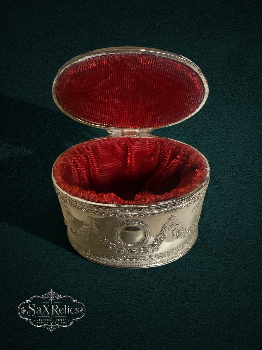 My Store vintage silver-plated keepsake box with intricate floral embossing and a vibrant red velvet interior lining.
