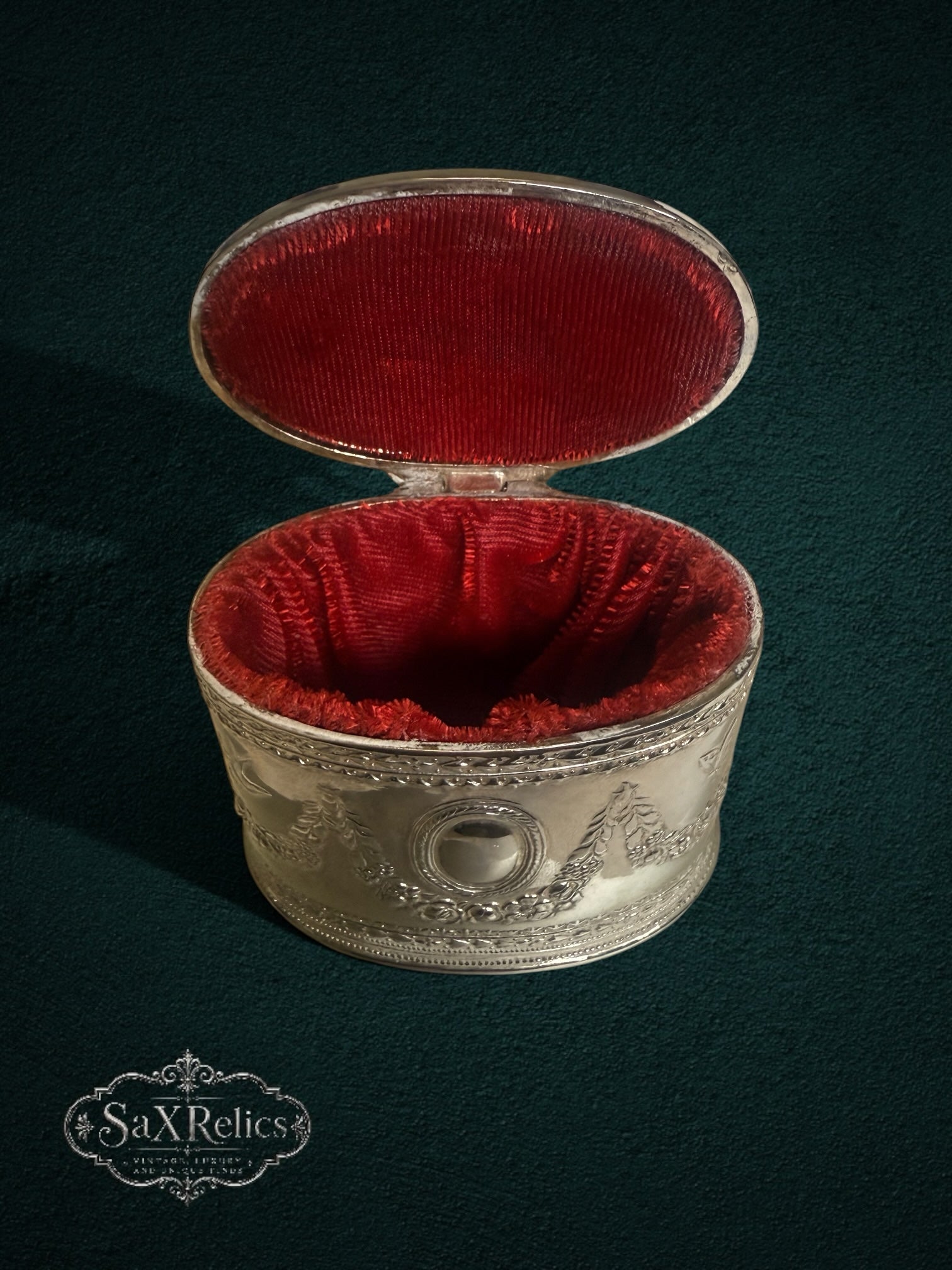 My Store vintage silver-plated keepsake box with intricate floral embossing and a vibrant red velvet interior lining.