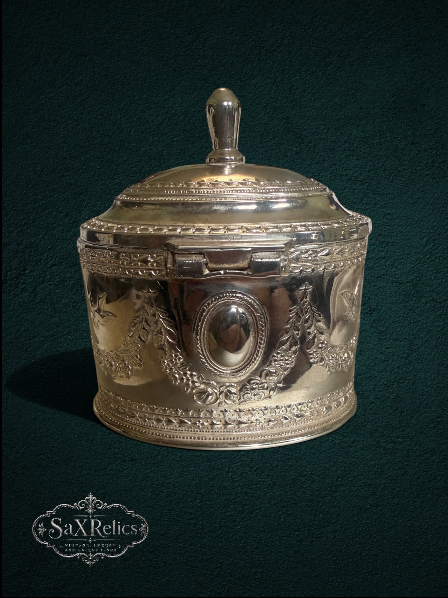 My Store vintage silver-plated ornate keepsake box with intricate floral embossing and a classic finial lid handle.