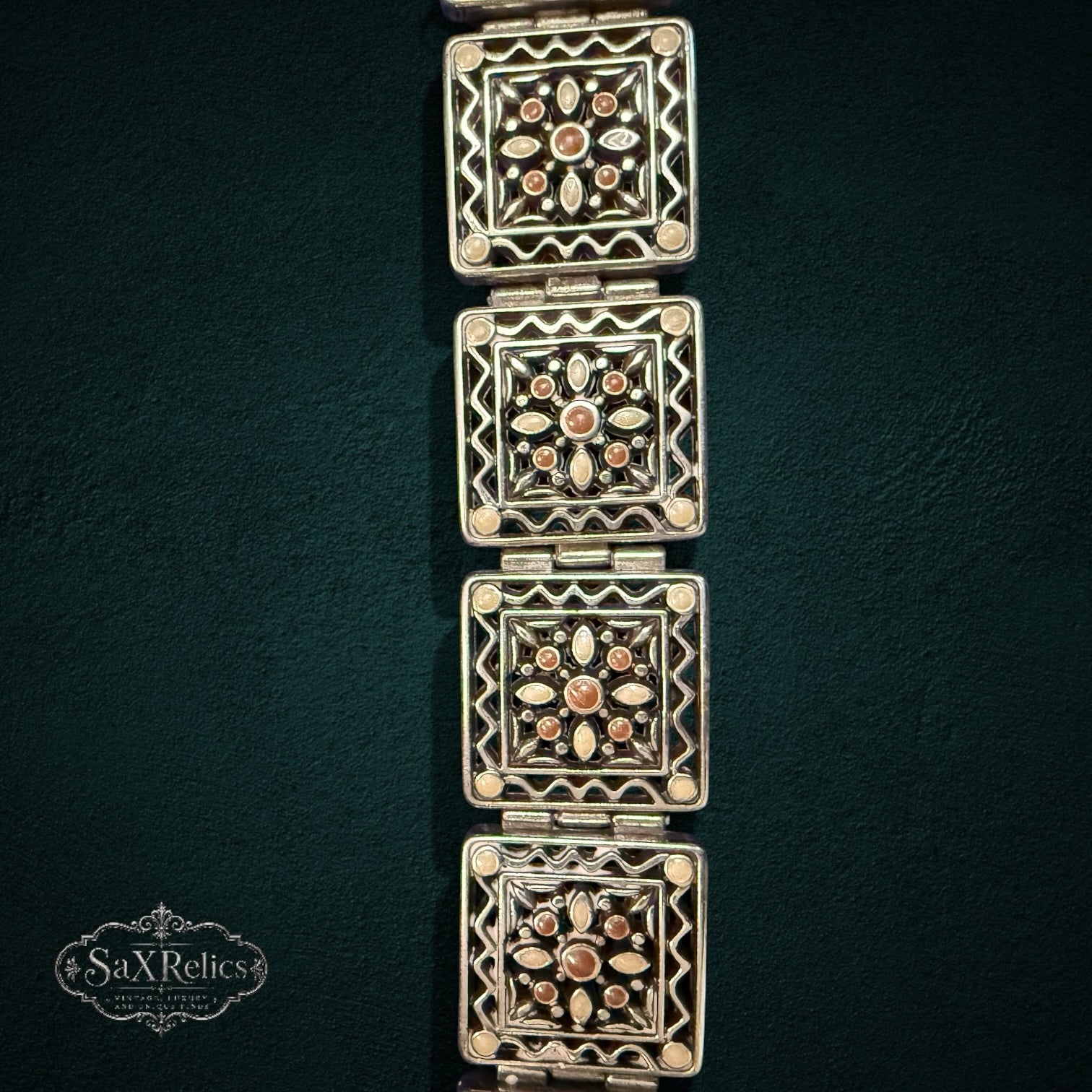 SaX Relics Brighton silver-plated embossed square link bracelet on a dark background