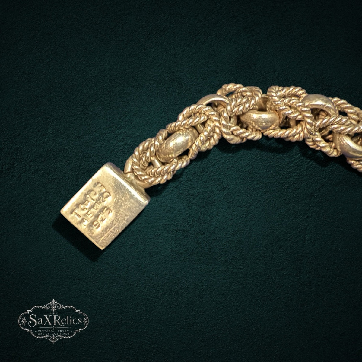 My Store vintage 925 sterling silver woven rope link bracelet with a secure box clasp and hallmark details.