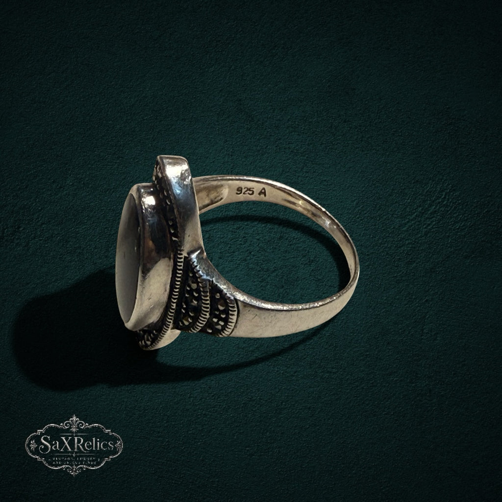 My Store vintage style 925 sterling silver oval ring with black onyx and marcasite detailing, side view