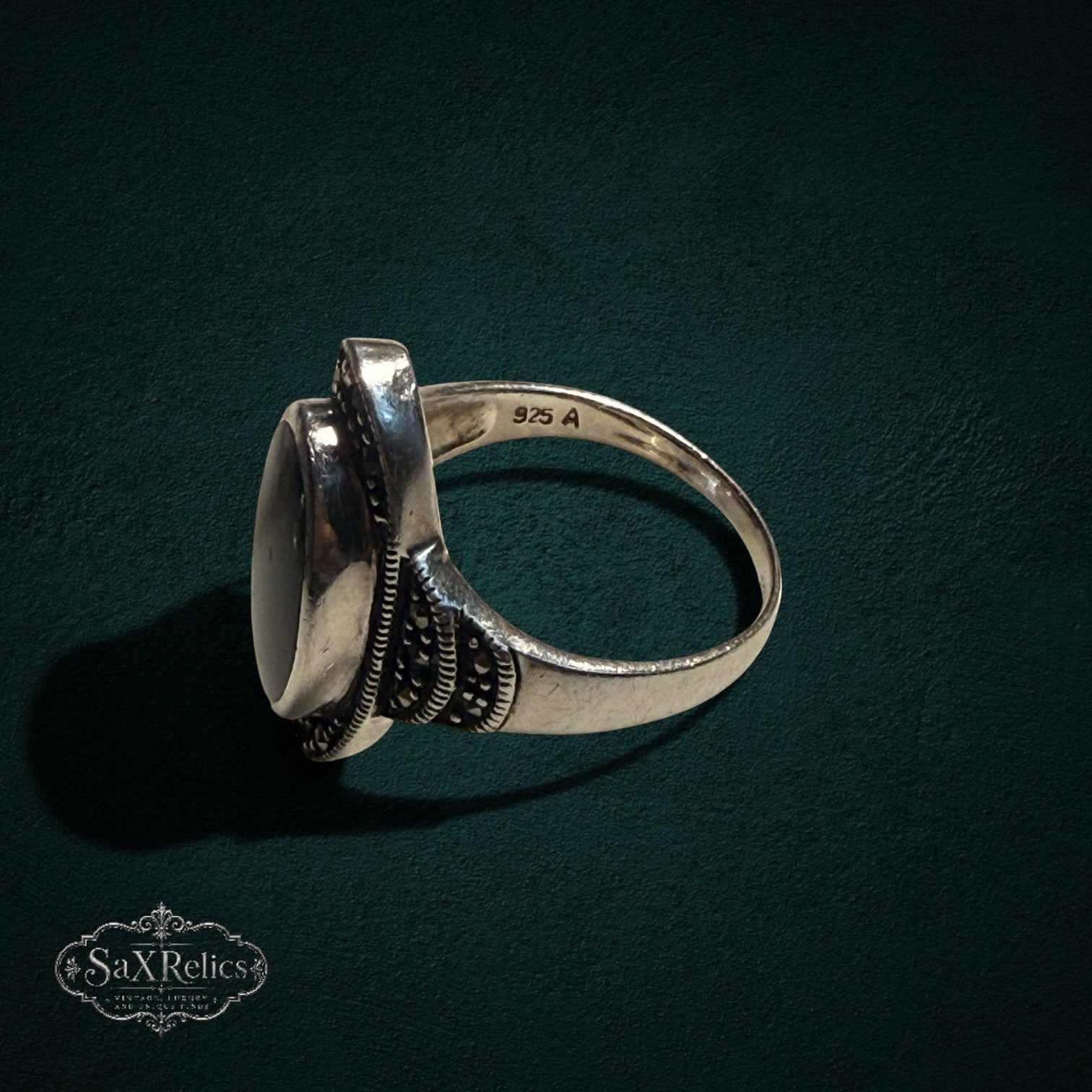 My Store vintage style 925 sterling silver oval ring with black onyx and marcasite detailing, side view