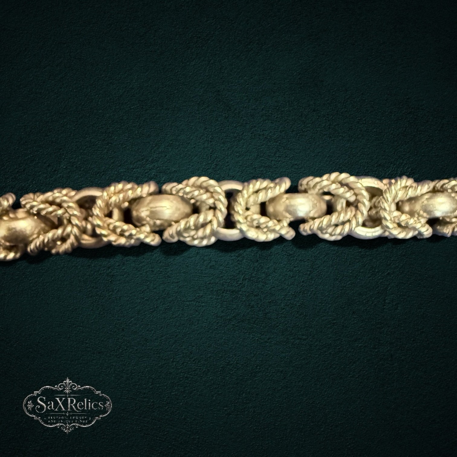 My Store vintage sterling silver bracelet featuring an intricate interwoven rope-link pattern with a textured finish.