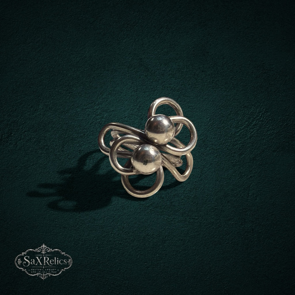 My Store SAXRelics vintage sterling silver statement ring featuring sculptural knotted wirework and polished spheres.