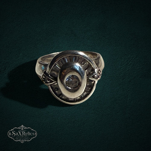 My Store SAXRelics vintage-style 925 sterling silver statement ring with a circular halo and baguette-cut accents.