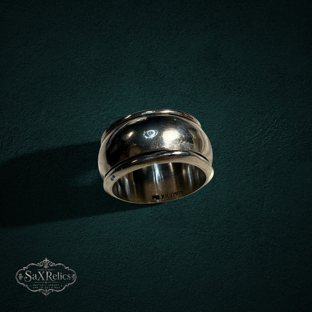 My Store vintage wide band ring in polished sterling silver with a smooth, curved silhouette and Mexico hallmark.