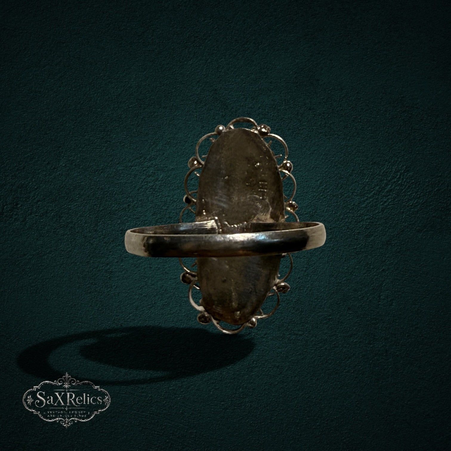 My Store SAXRelics vintage sterling silver ring with oval turquoise cabochon and intricate filigree back view