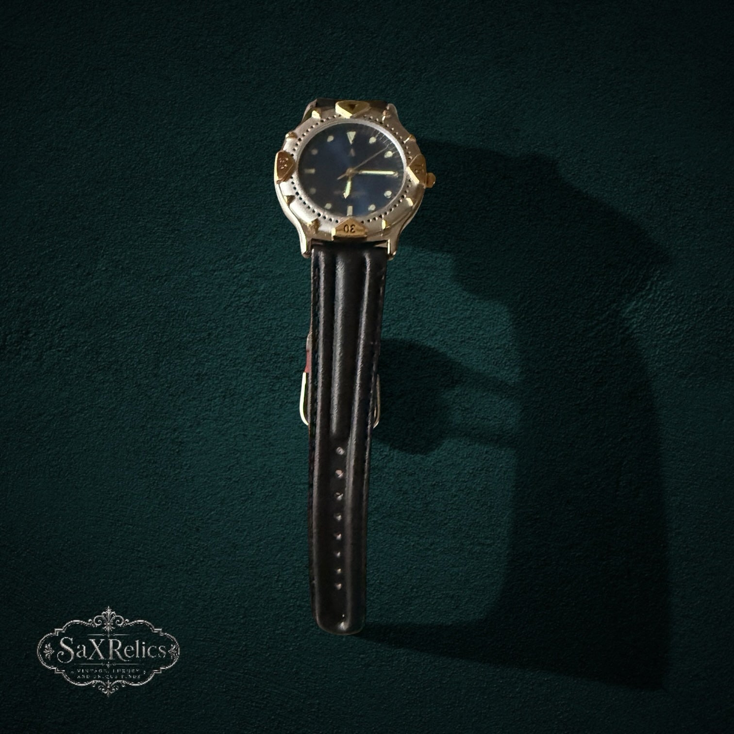 My Store vintage-inspired quartz watch with a deep blue dial, two-tone silver and gold case, and dark brown leather strap