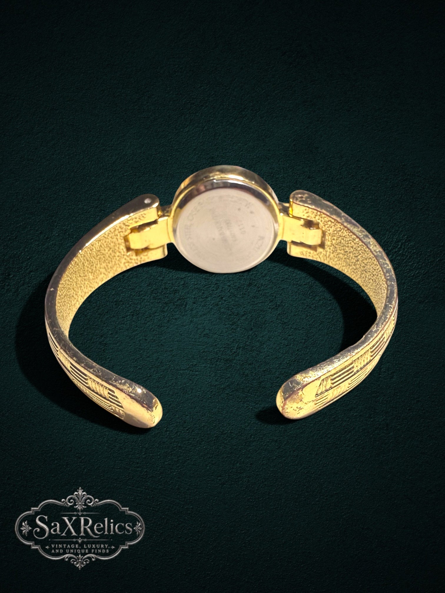 My Store Vivani gold-tone vintage cuff watch with textured geometric band and open-cuff design, back view